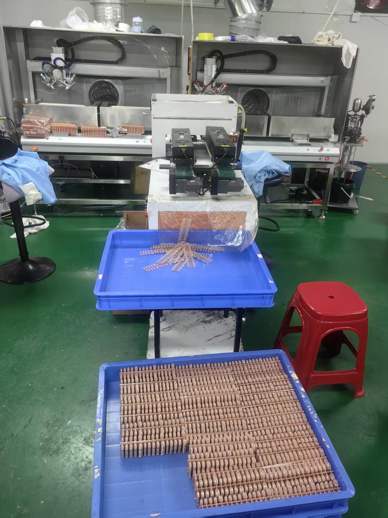 Nail trays moving through production